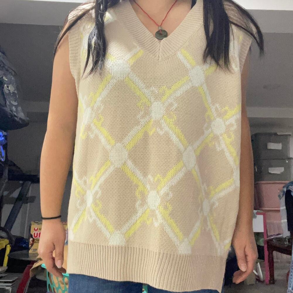 Yellow and white argyle sweater